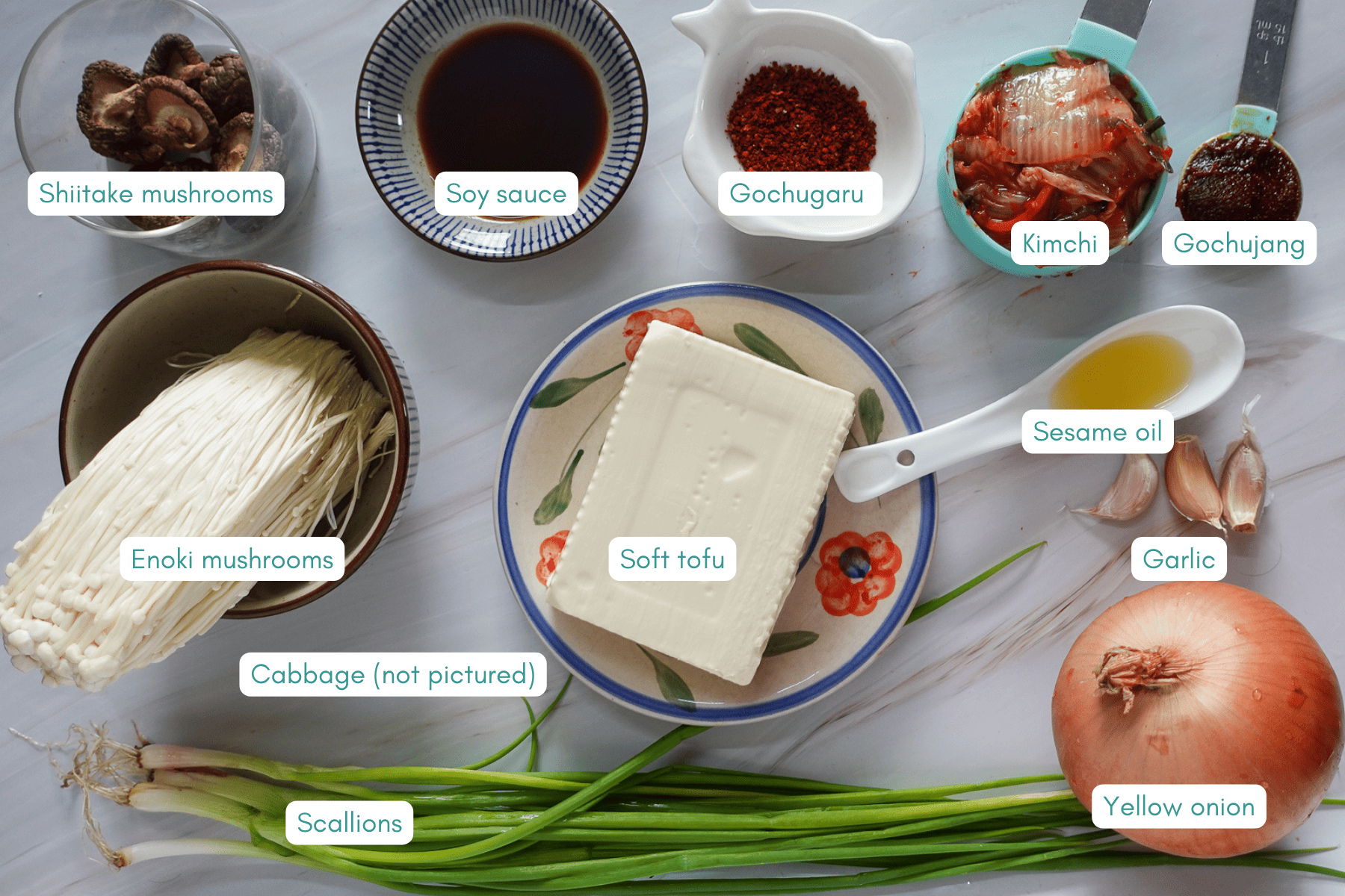 An overhead shot of Kimchi Jjigae ingredients