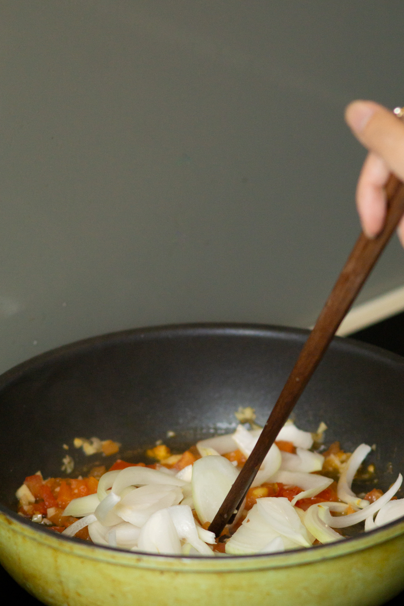 adding diced tomatoes and onion