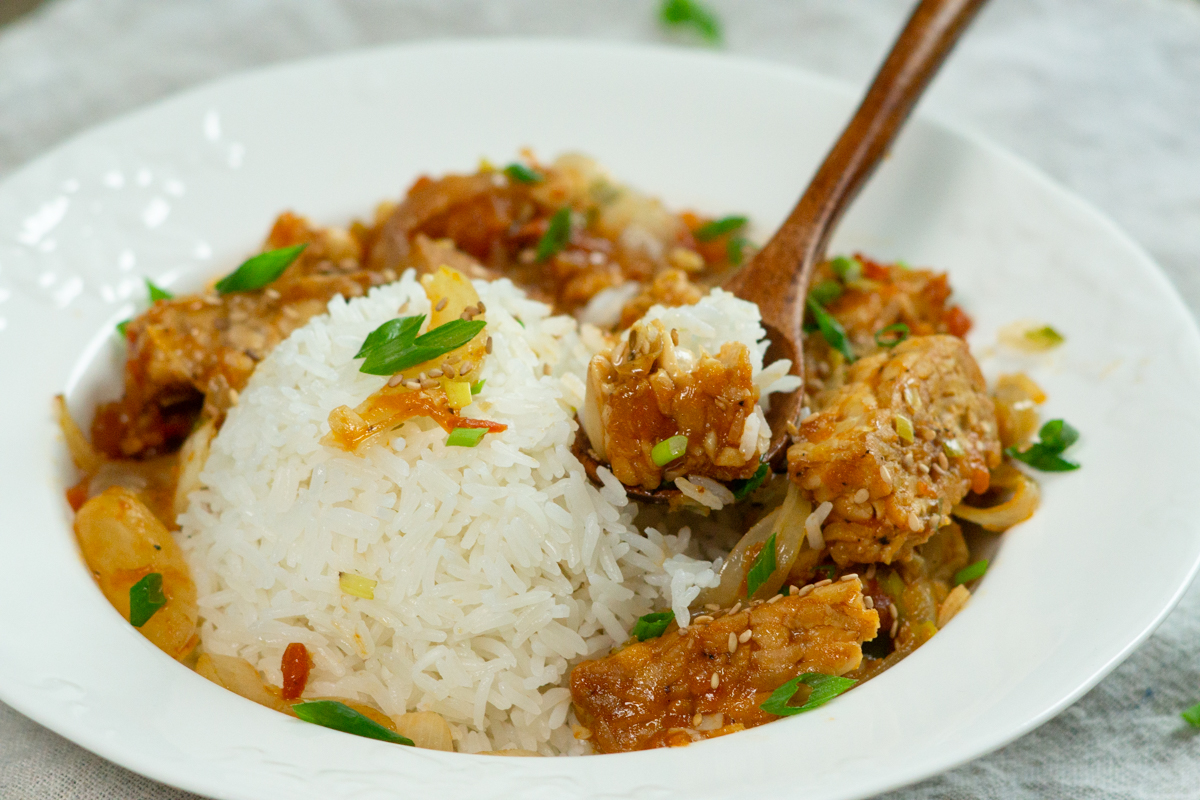 eating sweet and sour tempeh