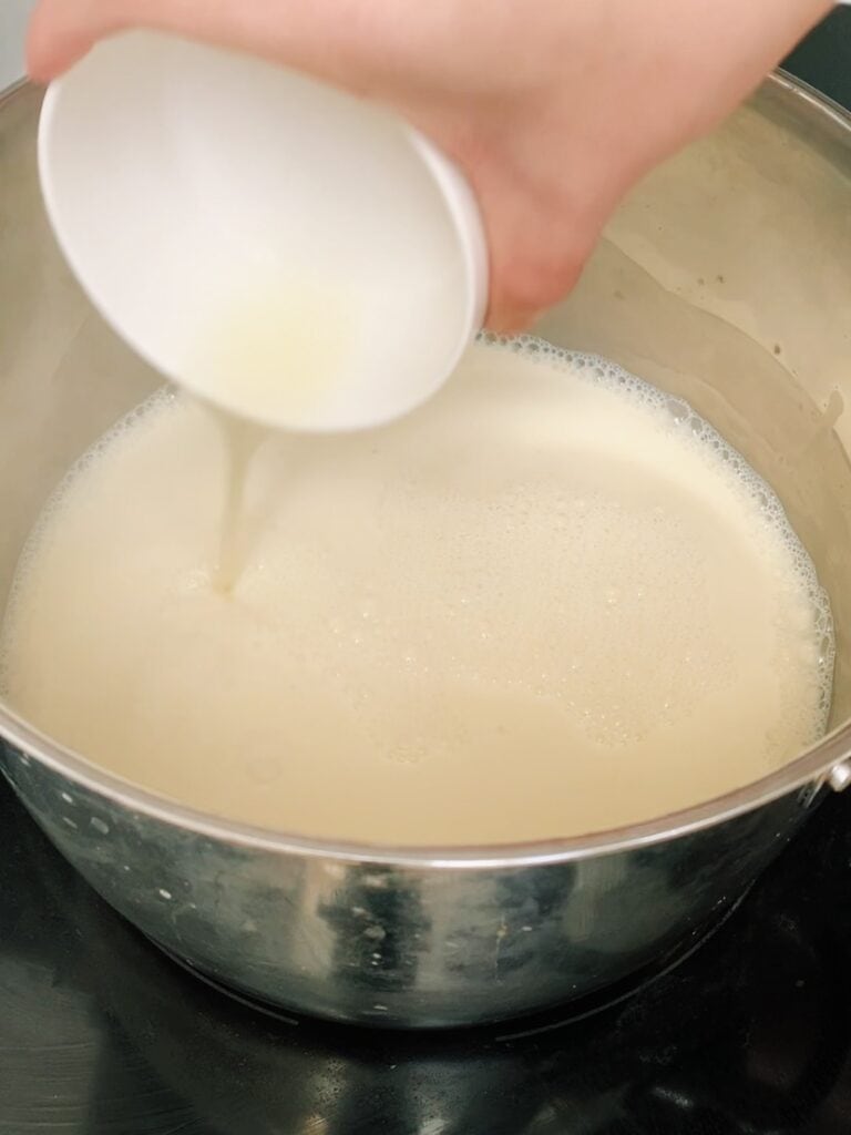 Add salt and lime juice to soy milk