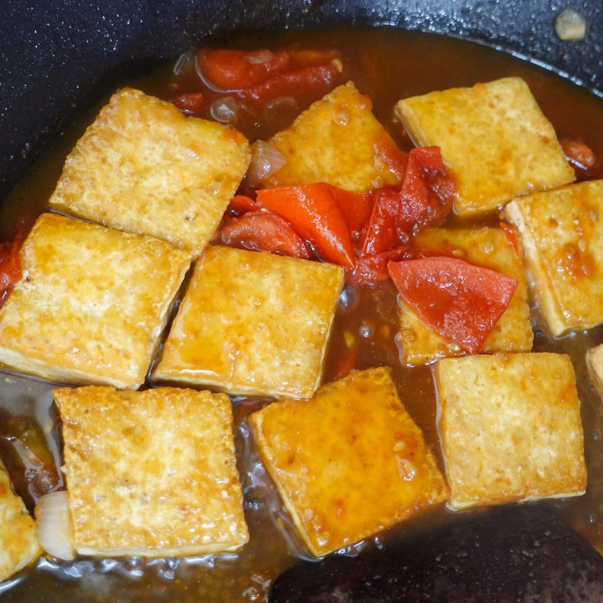 Add in the tofu and seasonings