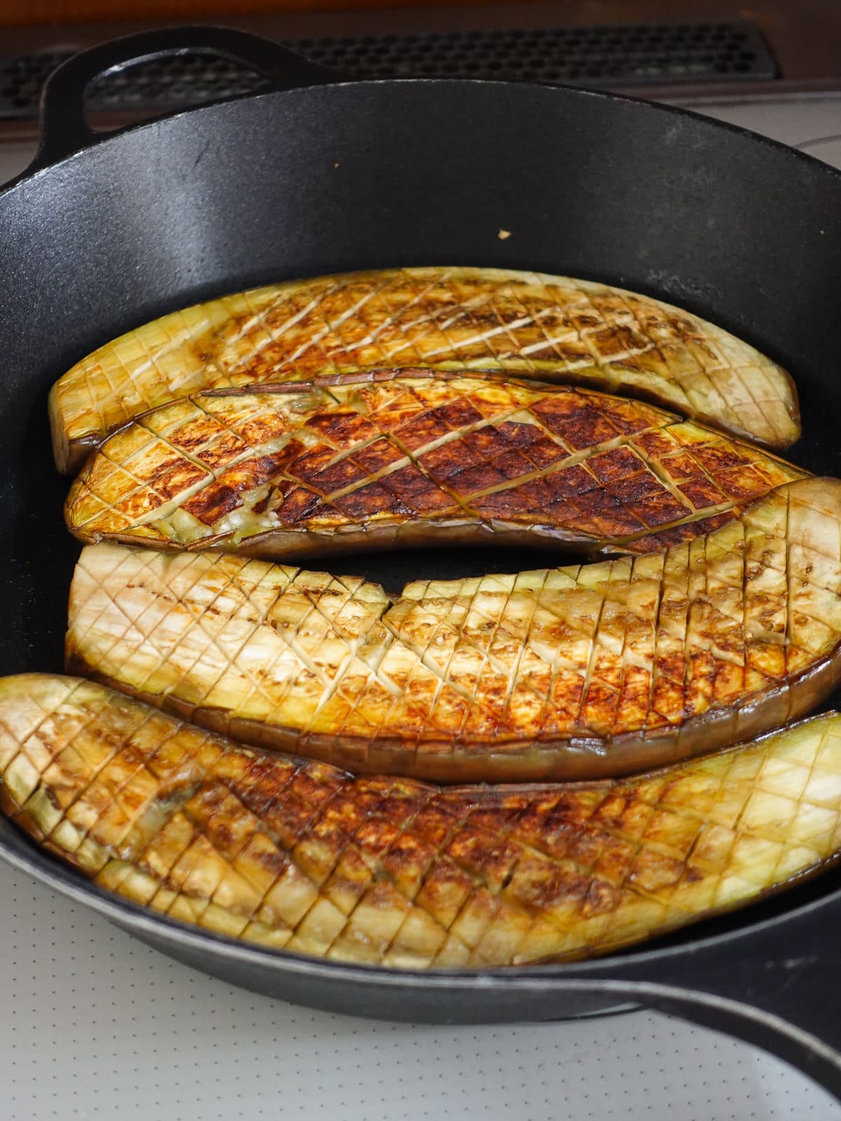Fry eggplant until charred