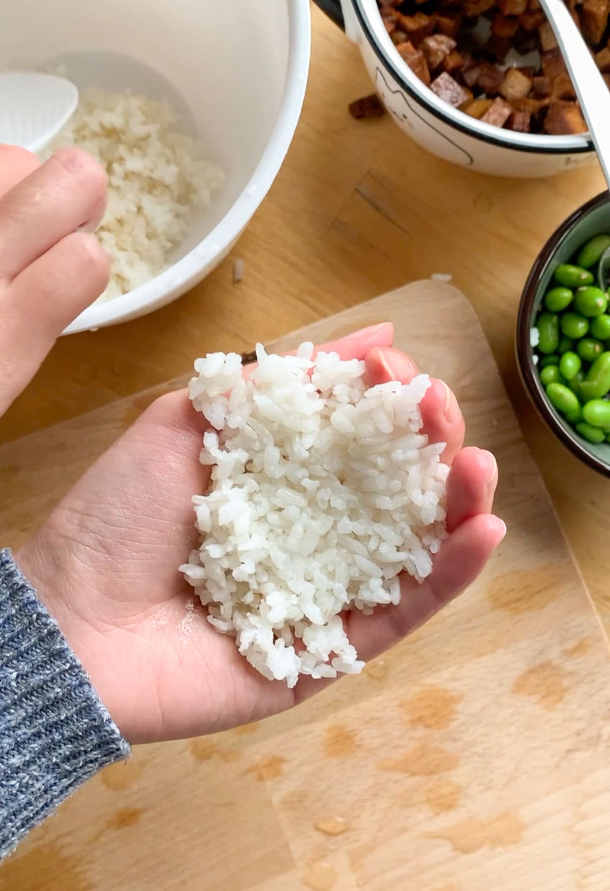 Add rice to your hand