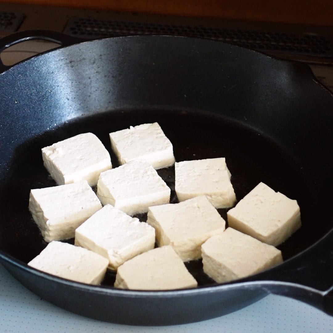 Add tofu to frying pan