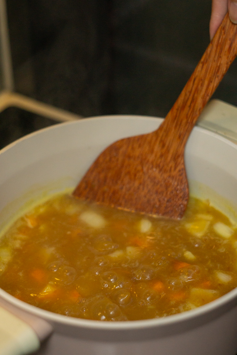 simmering the broth until thicken