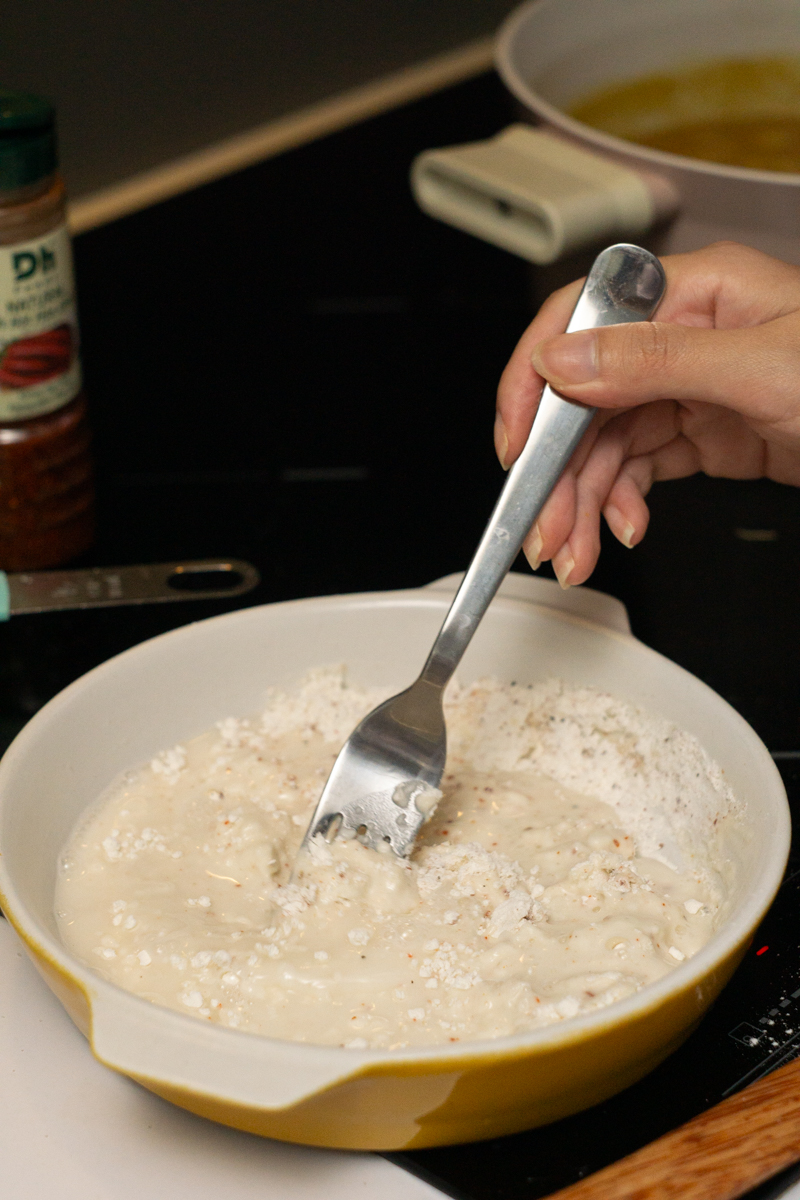 making a batter to dip the tofu cutlets