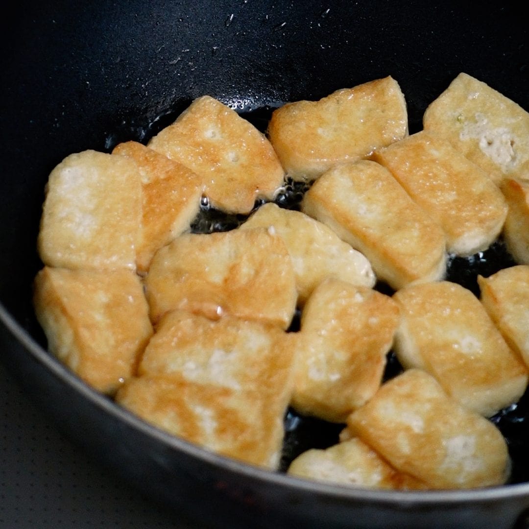 Fry the tofu until golden brown