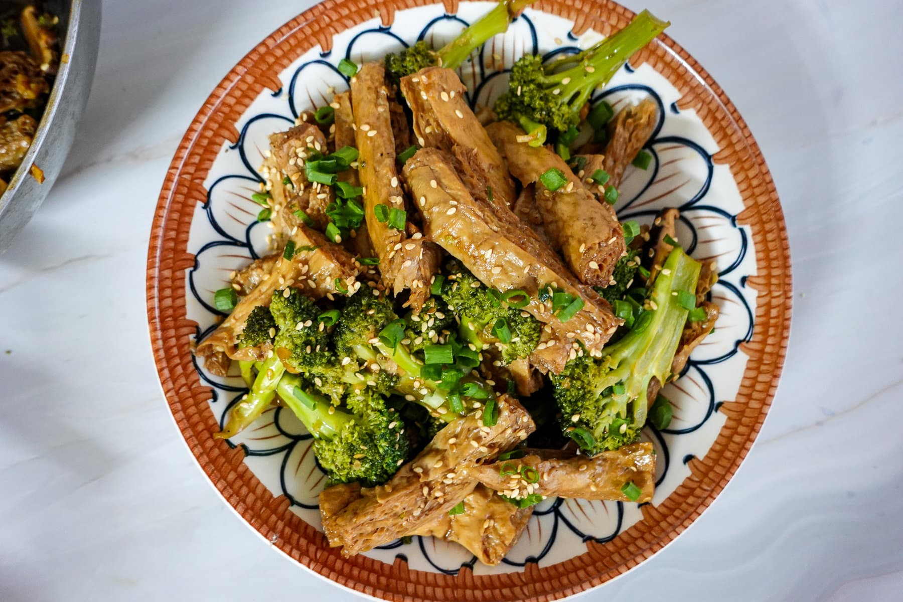 a dish of vegan beef and broccoli