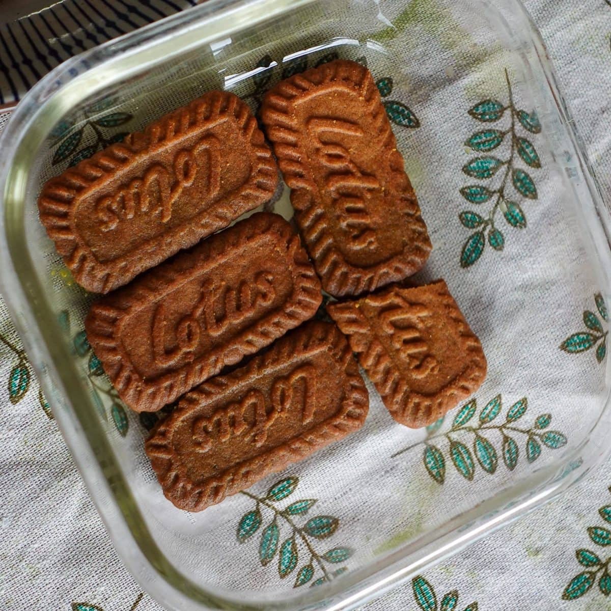 Add a layer of Biscoff cookies