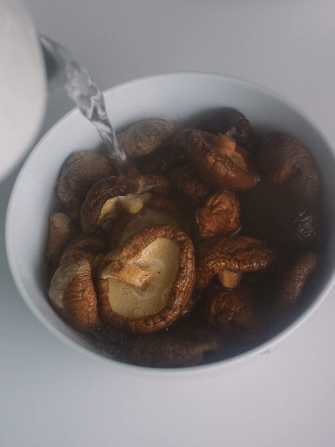 Rehydrate the mushrooms