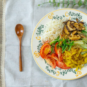 Fully assembled cold ramen on a plate.
