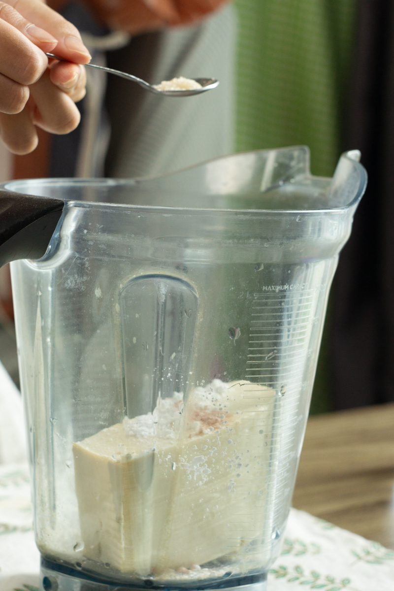 adding all egg white ingredients in a blender