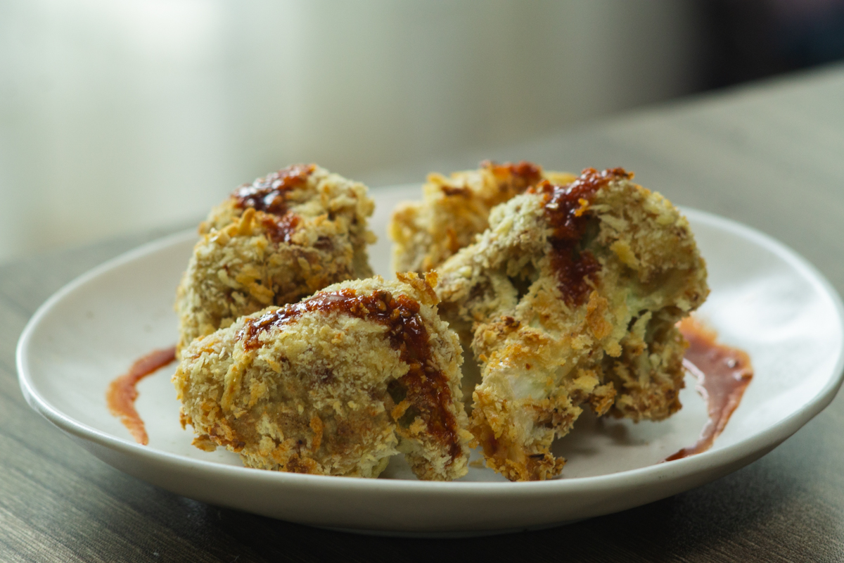 crispy cauliflower florets with gochujang sauce