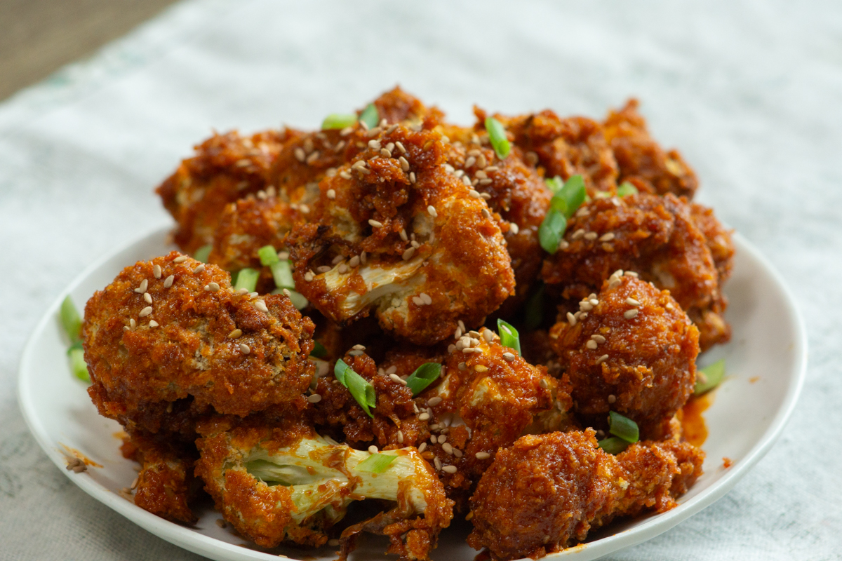 cauliflower florets mixed with gochujang sauce