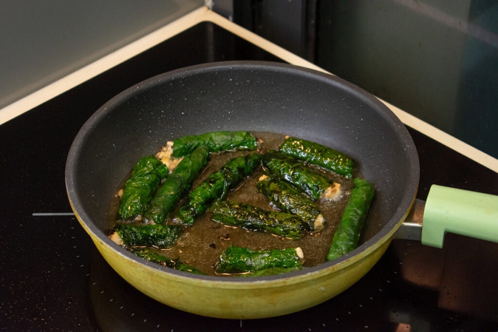 frying Vegan Betel Leaf Rolls