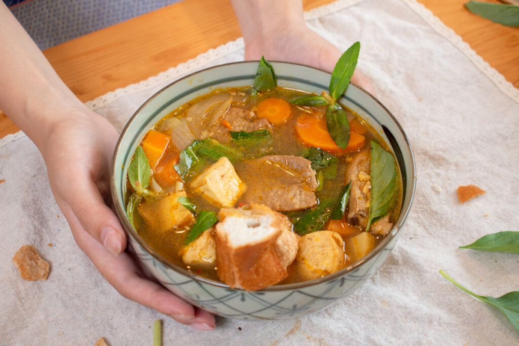 serving vegan vietnamese beef stew