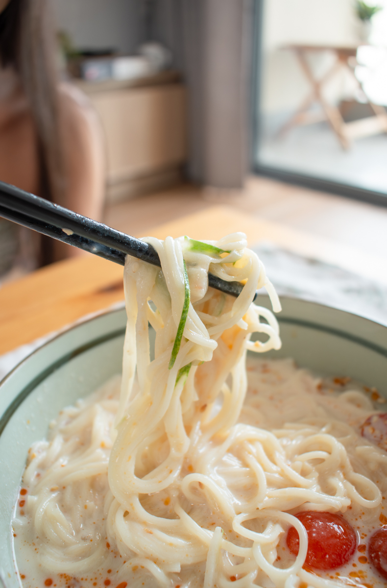 eating soy milk noodles